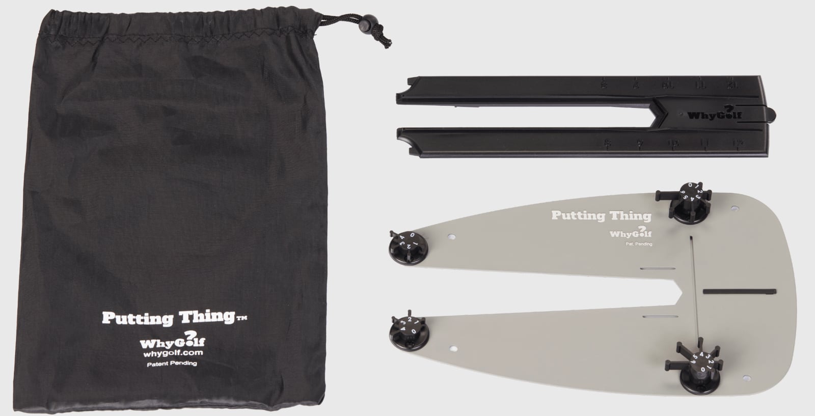 WhyGolf Putting Thing with its alignment rail and travel bag, studio view
