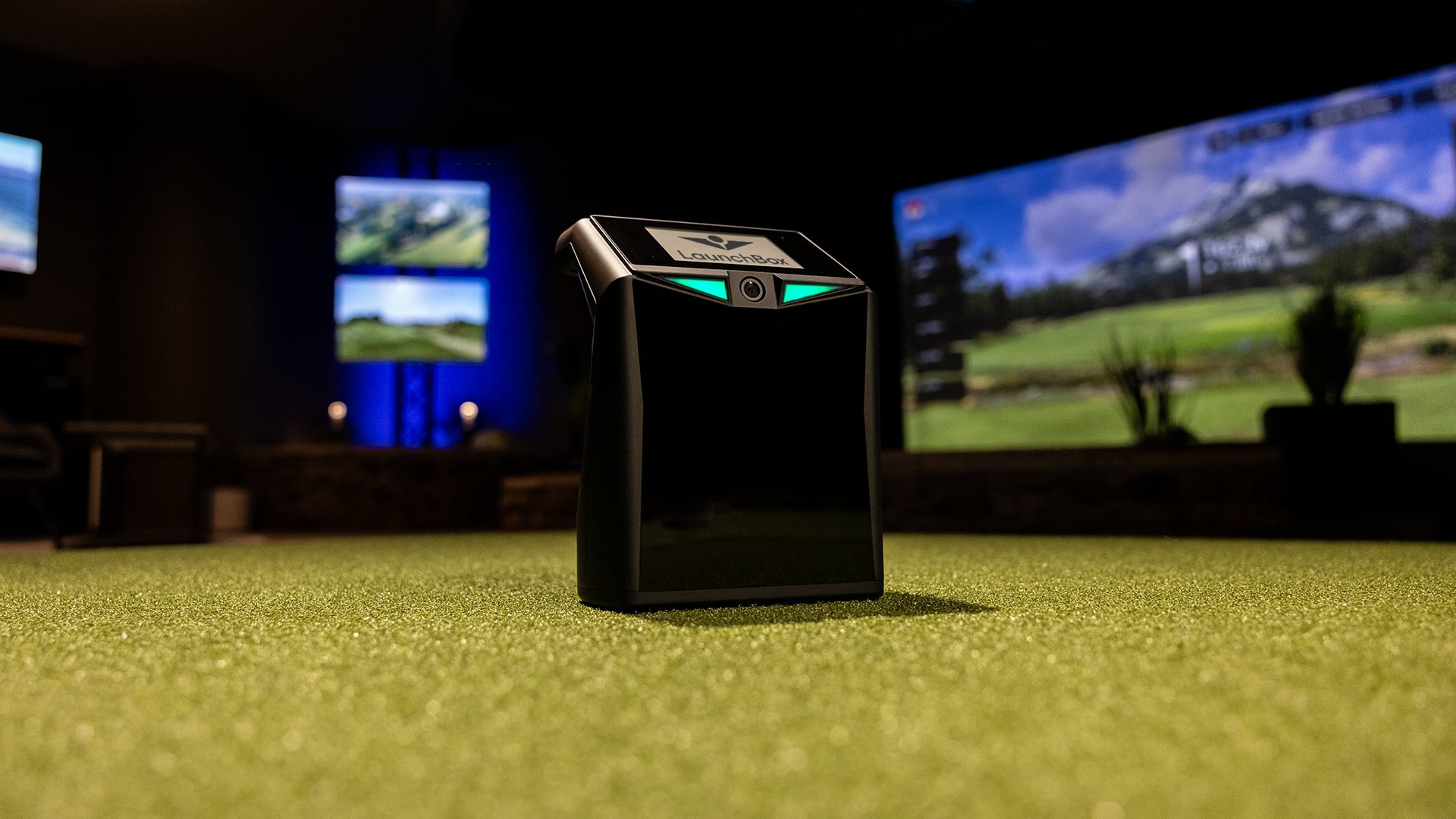 TruGolf LaunchBox in a simulator bay, wide view