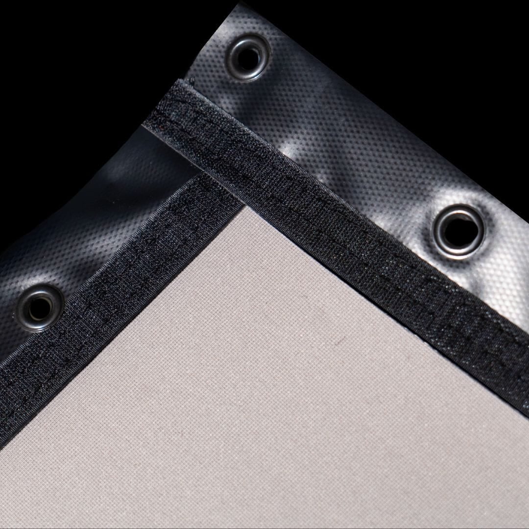 SIGPRO Premier impact screen corner, light screen face with black trim and grommets